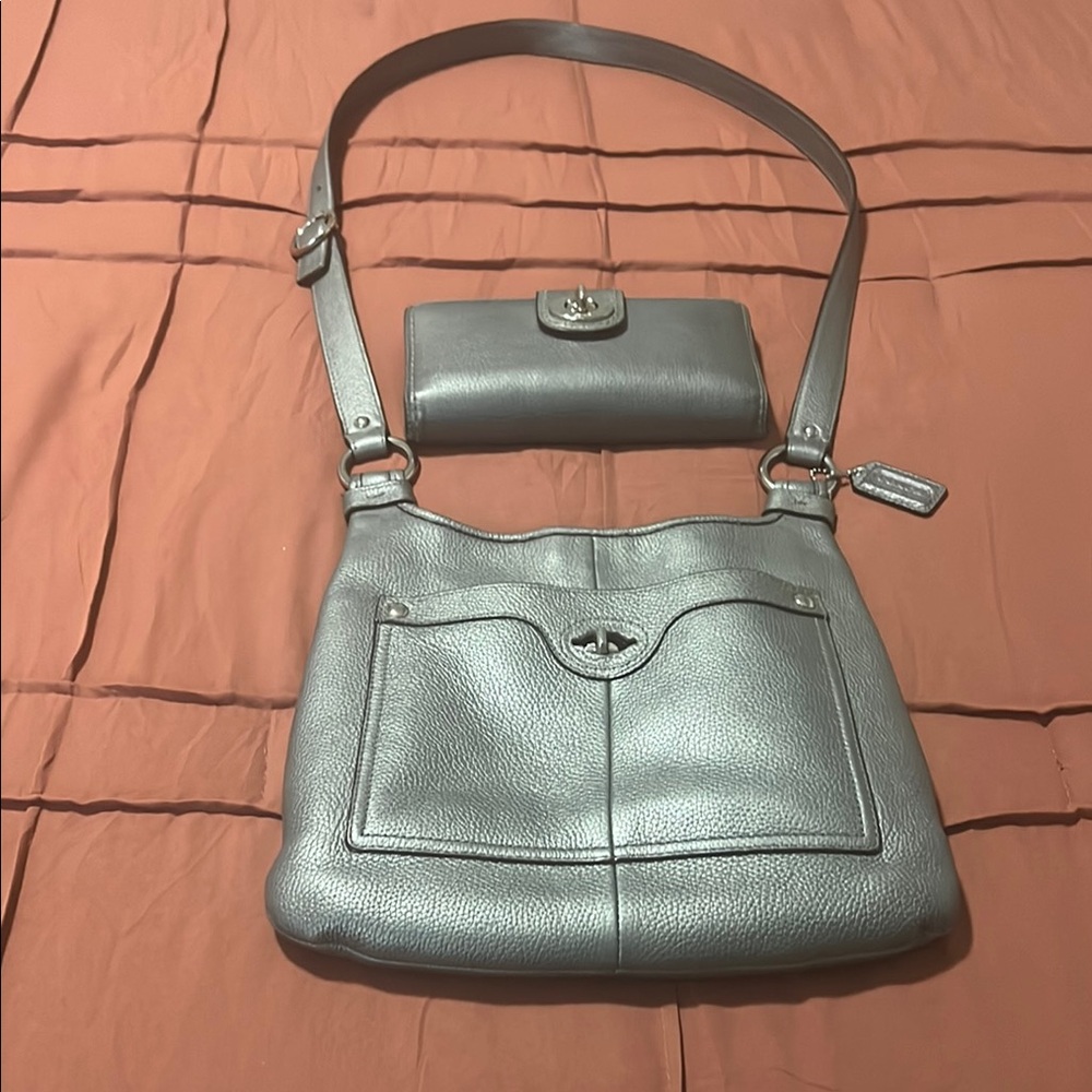 Shimmering Silver Coach Crossbody Bag with Adjustable Strap and matching Wallet